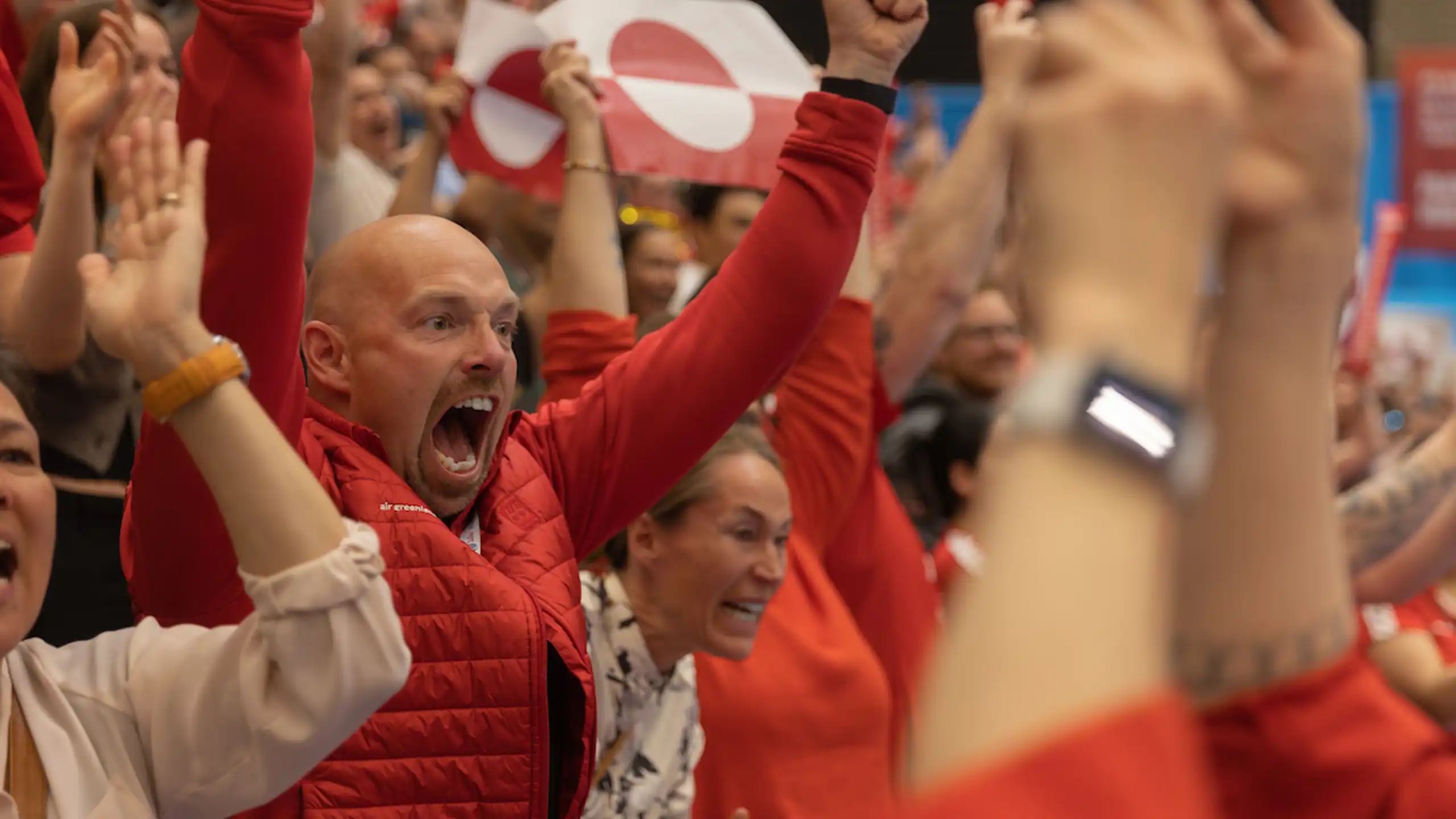 CEO of Air Greenland Group cheering on the women during the final match against Canada. Photo: Lars Kleemann Andersen