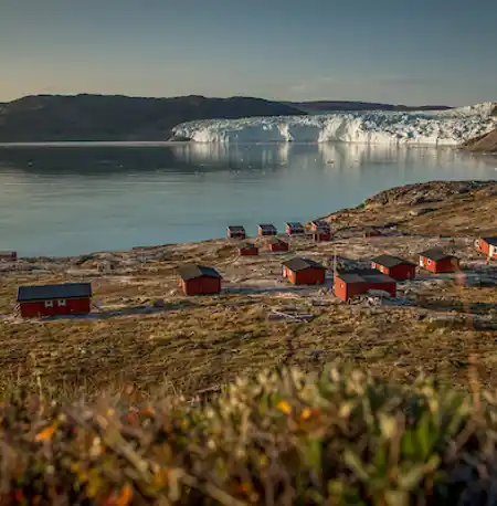 An Overview Of The Eqi Glacier Lodge Camp With The Glacier In The Background In North Greenland