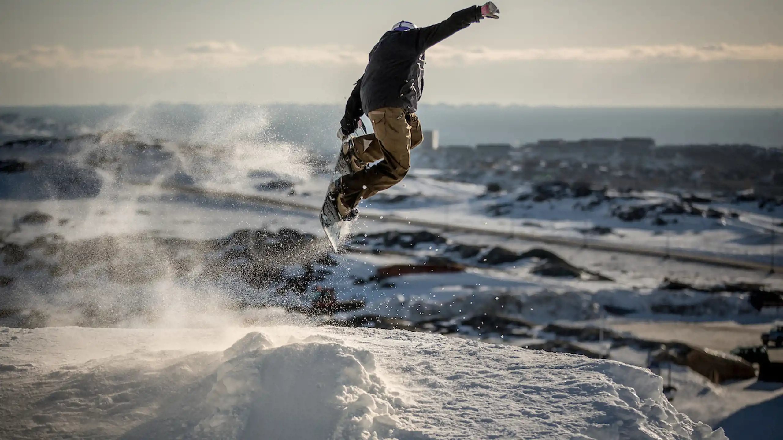 A Snowboarder In Nuuk Practicing For The Arctic Winter Games In Greenland