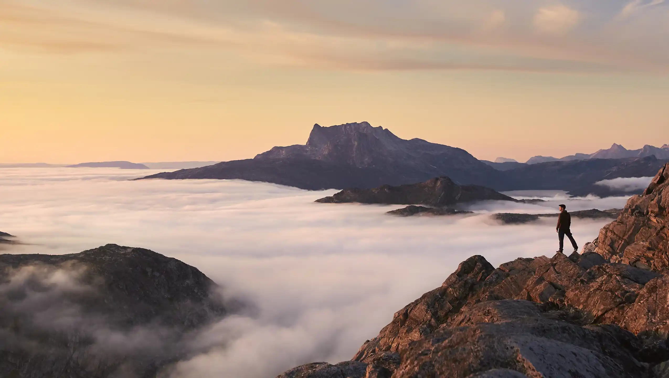 Hiker At Store Malene Peak, Nuuk. Photo Peter Lindstrom , Visit Greenland