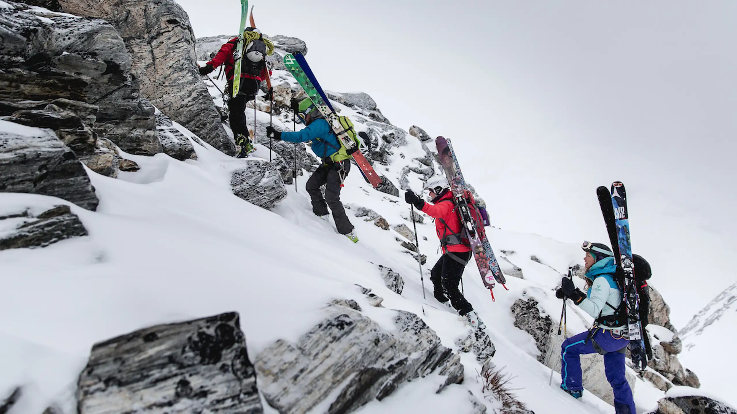 Skiers Climbing Towards Tasiilaq Mountain Hut In East Greenland